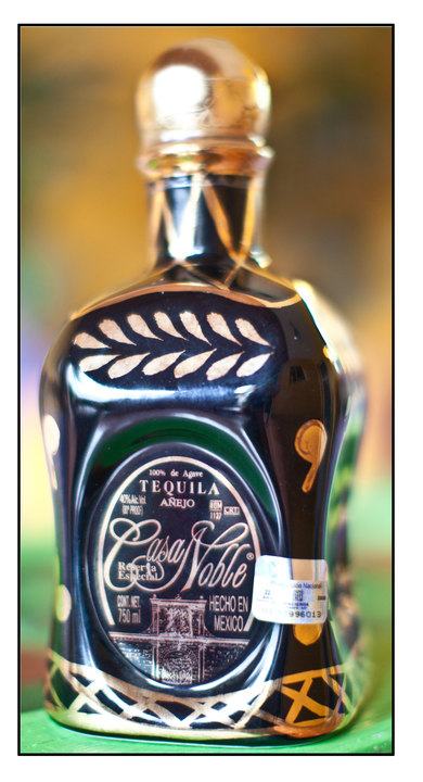 Bottle of Casa Noble 5 yr. Añejo (Basket Weave)