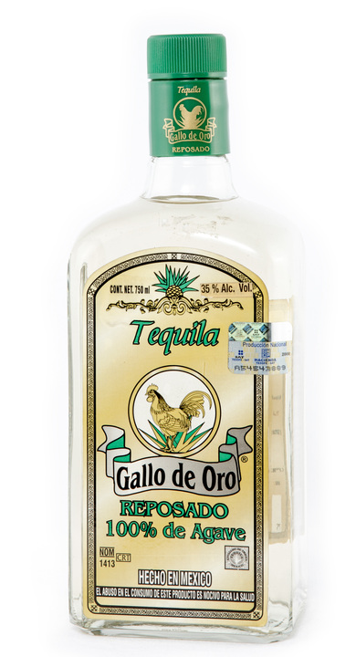 Bottle of Gallo de Oro Tequila Reposado